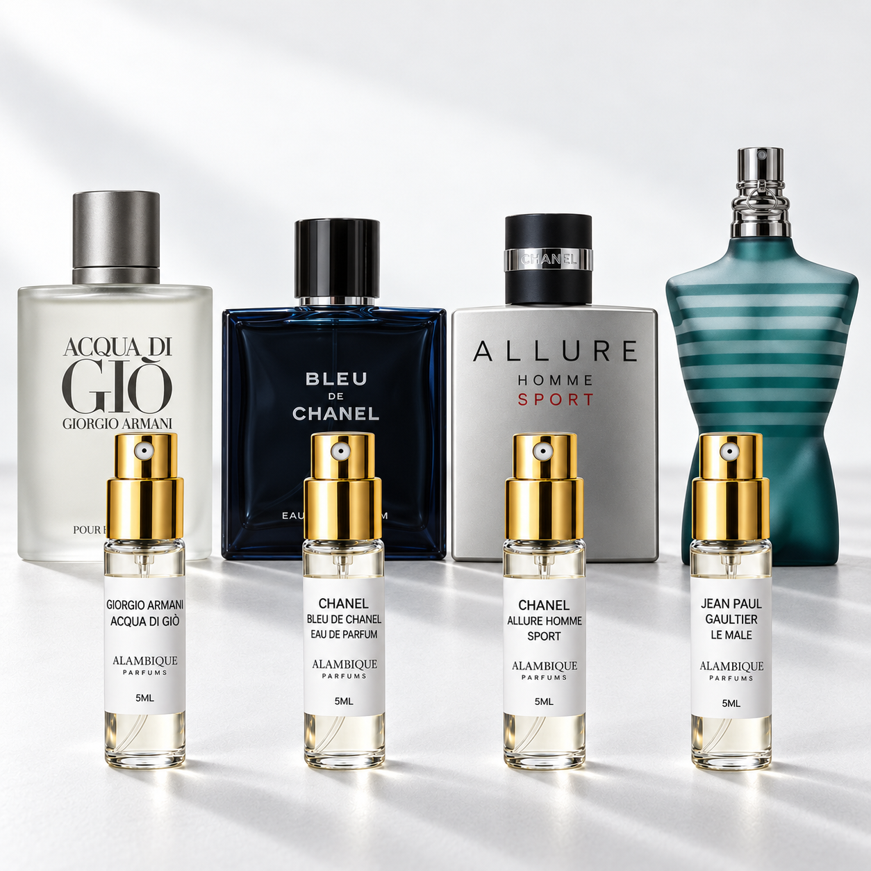 4 decants de Los Mejores Discovery Set con sus perfumes de referencia. Botellas completas no incluidas.